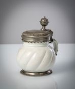 A WHITE GLAZED FAIENCE HABANER JAR