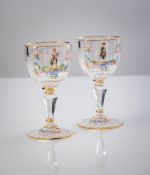 A PAIR OF ENAMEL PAINTED WINE GLASSES