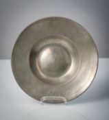 A PEWTER PLATE WITH GUILD EMBLEM