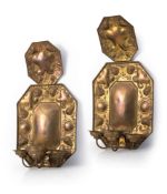 A LARGE PAIR OF EMBOSSED BRASS WALL LIGHTS