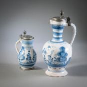 TWO PEWTER MOUNTED BLUE AND WHITE PAINTED FAIENCE JARS