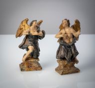 A PAIR OF WOODCARVED BAROQUE ANGELS