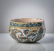 A LARGE FLORAL PAINTED MAIOLICA BOWL