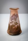 AN EMILE GALLE FLORAL PATTERN GLASS VASE