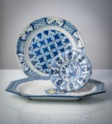 THREE BLUE AND WHITE PAINTED FAIENCE DISHES