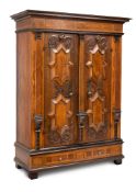 A South German walnut and oak cupboard