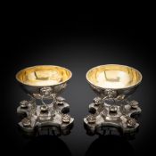 A PAIR OF PARCIAL GILT SILVER SALT CELLARS