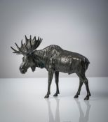A PATINATED BRONZE FIGURE OF AN ELK