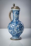 A LARGE PEWTER MOUNTED BLUE AND WHITE PAINTED FAIENCE JAR