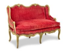 A LOUIS XV CREAM AND GREAN PAINTED SOFA