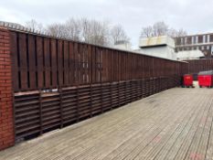 Brown Wooden Fence With Spike Strip