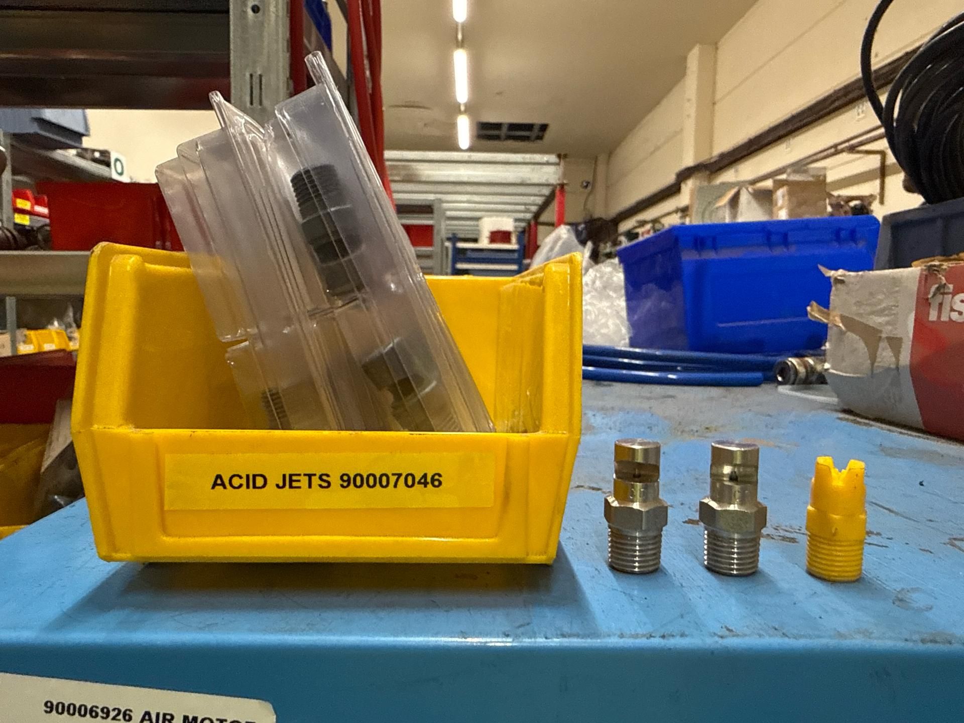 Bin of Assorted Acid Jets