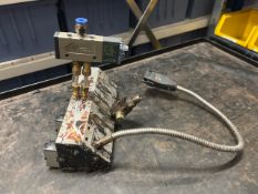 Used Nordson 4-Station Pneumatic Solenoid Valve Manifold Assembly