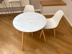 White Wooden Table With Two Plastic Chairs