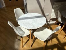 White Wooden Table With Three Plastic Chairs