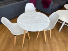 White Wooden Table With Three Plastic Chairs