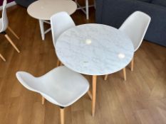 White Wooden Table With Three Plastic Chairs