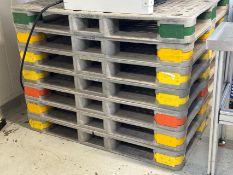 Stack of 7 Plastic Pallets