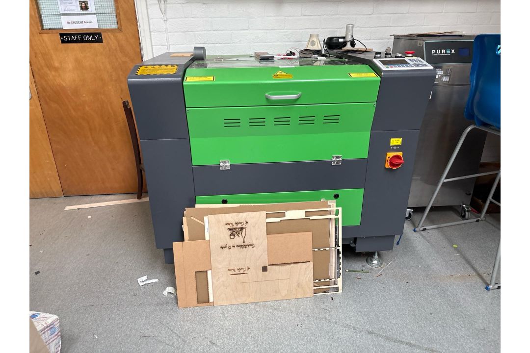 Laser Cutting Machine Used for cutting and engraving wood No visible ...