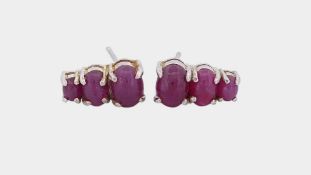 Paar Ohrstecker mit Rubin Cabochons, Sterlingsilber 925/- gest., Schieber fehlen, Länge 1,2 cm, Gew