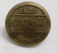 Enjoy Grapette Brass Sidewalk Marker