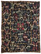 A FERGHANA IKAT SUZANI PANEL, EMBROIDERY PROBABLY LAKAI, UZBEKISTAN, LAST QUARTER 19TH CENTURY