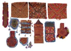 A COLLECTION OF EIGHT KATAWAZ EMBROIDERIES, AFGHANISTAN, AND THREE BELUCH POUCHES, 20TH CENTURY