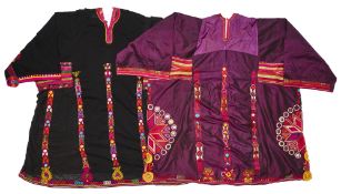 TWO EMBROIDERED AND MIRRORWORK PASHTUN DRESSES, BELUCHISTAN OR AFGHANISTAN, MID 20TH CENTURY
