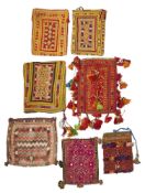 A COLLECTION OF SEVEN EMBROIDERED POUCHES, MAINLY BELUCH, 20TH CENTURY