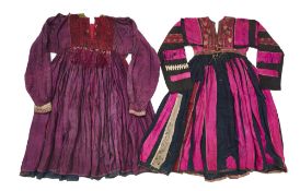 TWO EMBROIDERED AND APPLIQUE WAZIRI DRESSES, AFGHANISTAN OR PAKISTAN, EARLY 20TH CENTURY
