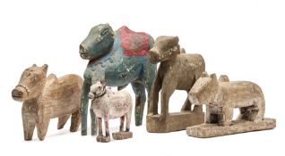 FIVE CARVED WOOD FIGURES OF NANDI BULL, INDIA, 19TH/20TH CENTURY
