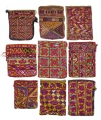 A COLLECTION OF NINE SMALL EMBROIDERED BAGS (HALTA). CENTRAL ASIA/AFGHANISTAN, EARLY 20TH CENTURY