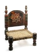 A CARVED AND TURNED WOOD LOW CHAIR, SWAT VALLEY, PAKISTAN, 19TH OR EARLY 20TH CENTURY