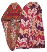 AN EMBROIDERED AND IKAT KARAKALPAK KIYMESHEK (CLOAK), AND A QUILTED IKAT PARANJA, 1875-1900