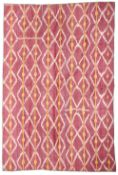 AN IKAT QUILTED PANEL, UZBEKISTAN, LATE 19TH CENTURY
