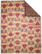 A LARGE IKAT QUILTED PANEL, UZBEKISTAN, MID 19TH CENTURY