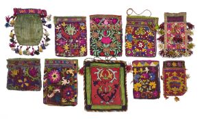 A COLLECTION OF TEN EMBROIDERED LAKAI AND UZBEK POUCHES, 20TH CENTURY