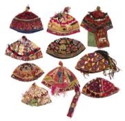 A COLLECTION OF HATS, UZBEK AND AFGHAN, 20TH CENTURY