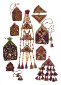 THREE EMBROIDERED AMULETS AND SIX EMBROIDERED POUCHES (BUKCHA), CENTRAL ASIA, CIRCA 1900