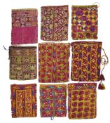A COLLECTION OF NINE SMALL EMBROIDERED BAGS (HALTA). CENTRAL ASIA/AFGHANISTAN, EARLY 20TH CENTURY