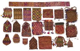 A COLLECTION OF EMBROIDERED PURSES AND POUCHES, HAZARA, AFGHANISTAN, LATE 19TH/EARLY 20TH CENTURY
