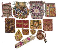AN UZBEK BEADED POUCH AND TWELVE OTHERS, SHAKHRISYABZ, BOKHARA, UZBEKISTAN, 19TH AND 20TH CENTURY