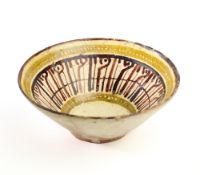 A NISHAPUR POTTERY BOWL, PERSIA, 10TH CENTURY