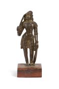 A BRONZE FIGURE OF KARUPPARAYAN, SOUTH INDIA, 19TH CENTURY