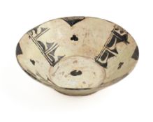 A SAMANID SLIP PAINTED POTTERY BOWL, CENTRAL ASIA OR NORTH EASTERN PERSIA, 10TH CENTURY