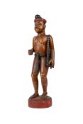 A CARVED AND PAINTED WOOD FIGURE OF A MAN, BURMA (NOW MYANMAR), CIRCA 1800