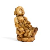 A SMALL CARVED BONE FIGURE OF A MOTHER AND CHILD, WESTERN INDIA, 18TH/19TH CENTURY
