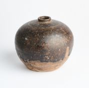A KHMER BROWN GLAZED POTTERY BOTTLE, CAMBODIA, 12TH CENTURY