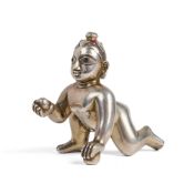 A GEM-SET SILVER FIGURE OF BALAKRISHNA, BENGAL, 19TH/20TH CENTURY