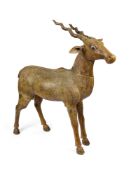 A CARVED AND PAINTED WOOD FIGURE OF AN ANTELOPE, SOUTHERN INDIA, 19TH CENTURY